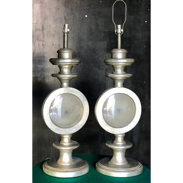 Pair of oversize Italian silver leaf table lamps with antique mirror.