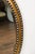 An Irish Midcentury oval shaped mirror with gilded and ebonized wood, adorned with cut glass, diamonté décor. Embodying...