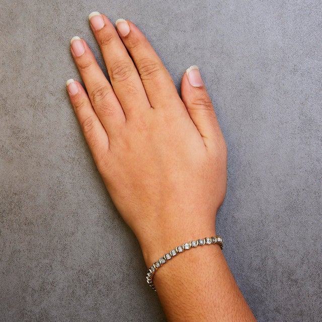 14K Yellow Gold Plated .925 Sterling Silver 1/4 Cttw Diamond Round Miracle Plate and "S" Link Tennis Bracelet (I-J Color, I2- I3 Clarity) - 7" For Sale In New York - Image 6 of 7