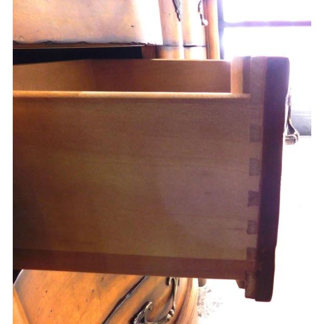 Century Furniture Country French 8-Drawer Fruitwood Dressing Chest. The chest has 8 drawers, the top left with an...