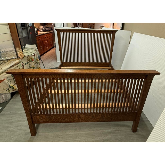 Design Plus Gallery presents a Full Size Oak Wood Bedframe in the Arts & Crafts/Mission Style. The bed frame has vertical...