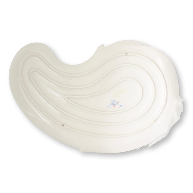 Delicate sculptural porcelain platter from Franz, featuring the beloved Ladybug pattern. High-relief daisies and leaves...