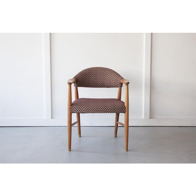 A lovely Model 223 occasional chair, designed by Kurt Olsen and produced by Slagelse Mobelvaerk with a solid oak frame and...