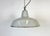Industrial grey enamel factory pendant light made by Thorlux in United Kingdom during the 1960s. White enamel inside the...