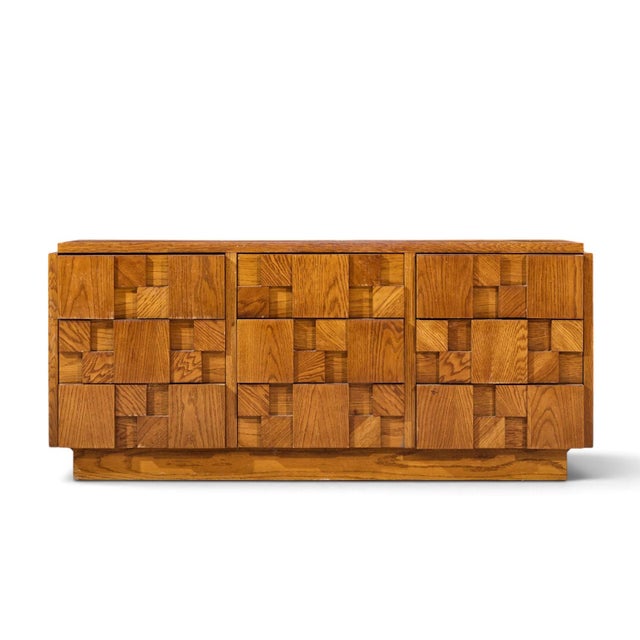 Lane Staccato Brutalist Mid Century Oak Lowboy Dresser This lowboy measures: 68.5 wide x 18.75 deep x 30 inches high Fair...