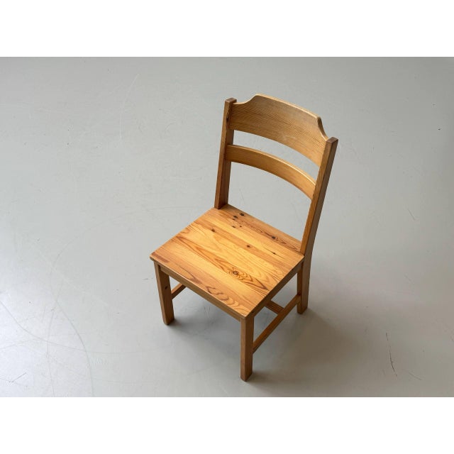 High-quality dining chairs from the swedish manufacturer nc sweden, crafted from solid pine. The chairs feature a...