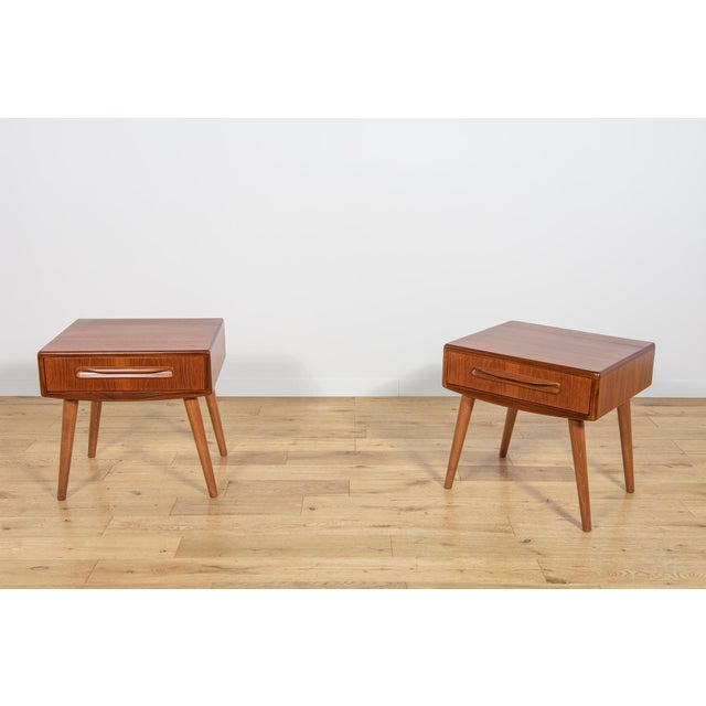 A pair of bedside tables designed by Victor Wilkins and manufactured in the 1960s by the British manufacturer G-Plan. The...
