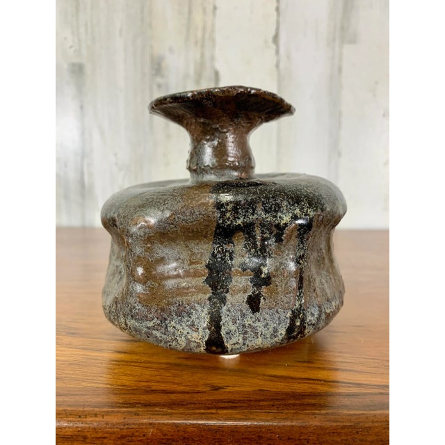 Mid-Century squat pottery with abstract glaze.