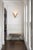 This exceptional pair of French Art Deco wall sconces showcase a modernist design, featuring a striking architectural...