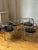 Exuberant "Locus Solus" dining chairs and table set, designed by Gae Aulenti for Poltronova circa 1964. With bent tubular...