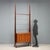 Elegant freestanding vintage Italian-made bookcase from the 20th century with exotic wood veneered uprights, a mahogany...