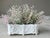 Excellent Pre-Owned Condition. Note: Faux greens are not included. Embodying an Italian sense of neoclassical rustic...