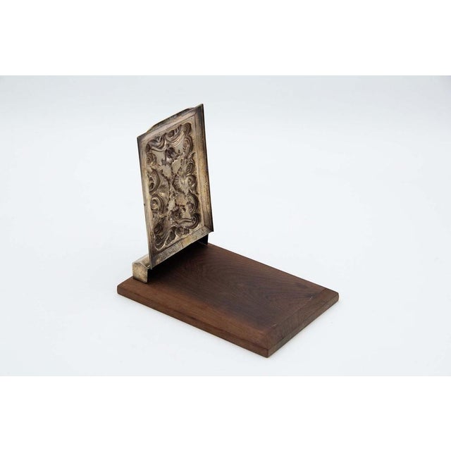 Brown Wooden Notepad Holder with Silver Accents, in Good conditions. Designed 1920 to 1949