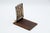 Brown Wooden Notepad Holder with Silver Accents, in Good conditions. Designed 1920 to 1949