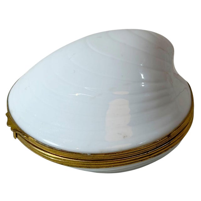 Limoges porcelain shell box, made in France in the early 1970s. Formed as a naturalistic shell, it is finished with a...
