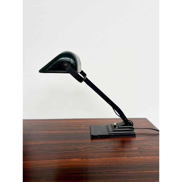 Erpe articulated desk lamp (brussels, founded 1914) — pantograph arm with multiple joints, a graphic silhouette of belgian...