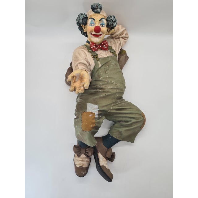 An exceptionally striking, large clown figurine by Jun Asilo, crafted in the Philippines in 1995. Characteristic of the...