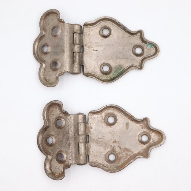 Traditional style offset surface mount ice box hinges made of brass with a nickel finish. The original mounting screws are...
