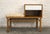 This oak telephone bench was designed by Raymond Lowey for Mengel Furniture Co. With its timeless mid-century design and...