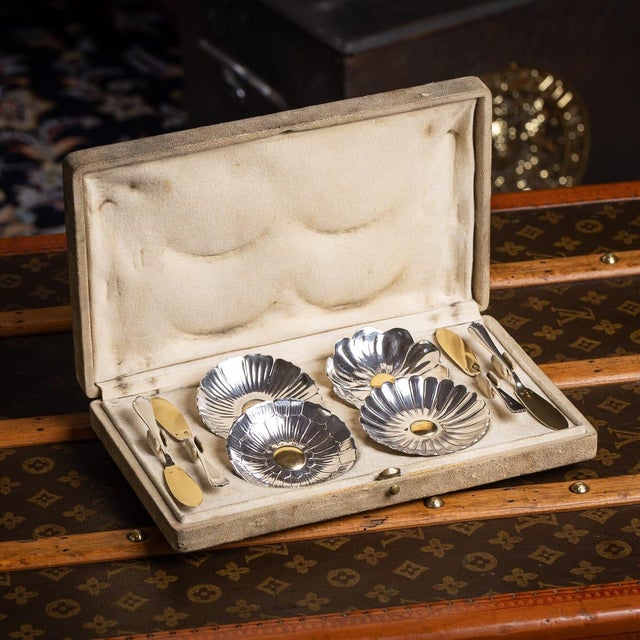 Antique 20th Century French fine French solid silver butter service by Christofle & Cie, Paris, comprising four flower-...