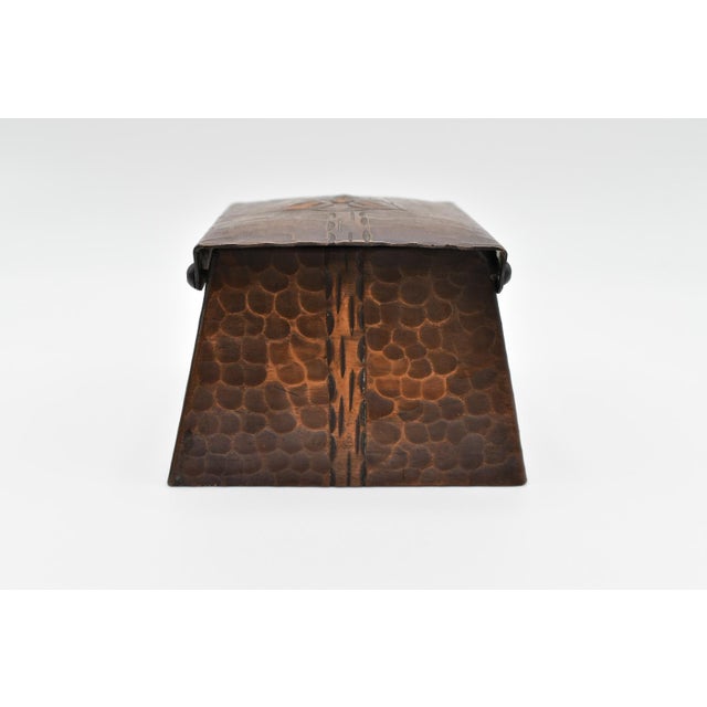 This if a stunning copper inkwell. It is stamped Craftsman Studios- Los Angeles. It has a beautiful hammered design...