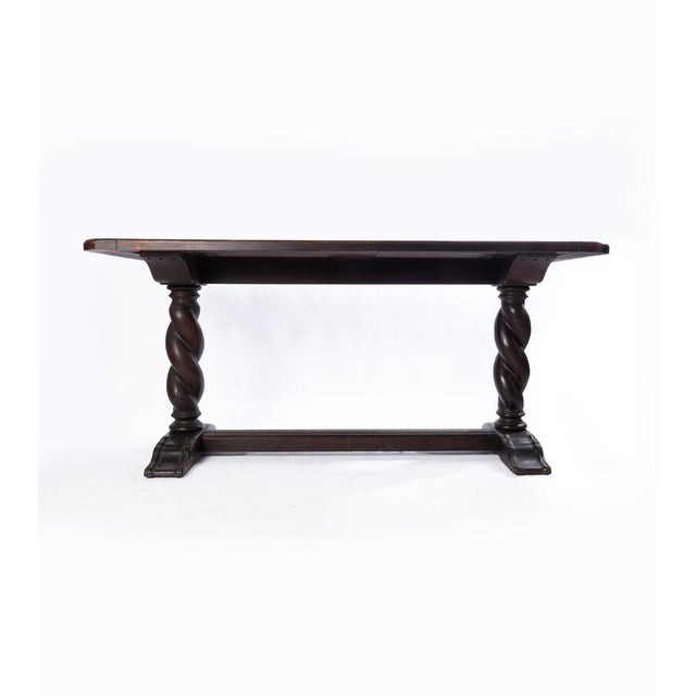 Carved oak barley twist hall table made by Flints Fine Furniture in New York. Beautiful carvings on this very solid table....