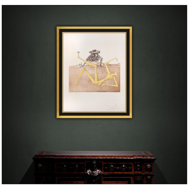 The artwork here, "The Heart of Madness" is a wonderful depiction of a surreal figure reclining in a landscape, with...