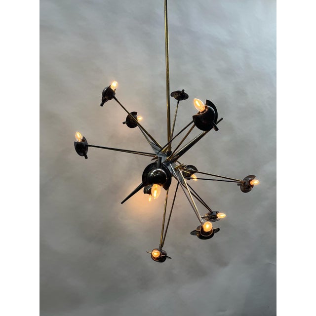 Brass Sputnik Lamp, 1950s, in Good conditions. Designed 1950 to 1959 Up to 250V (Europe/UK Standard).The wiring of this...