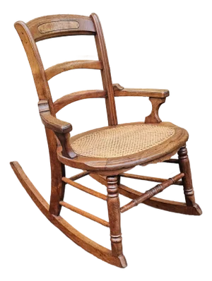 Early 20th Century Victorian Walnut and Cane Seat Rocker