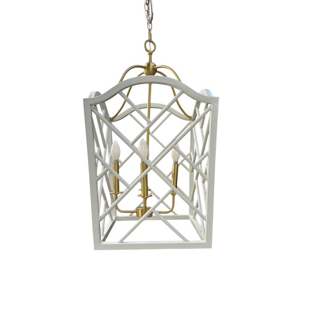 This is a discontinued Ballard Designs "Fai" 4-light pendant lantern (Item #LC991) and a favorite of ours for its bright,...
