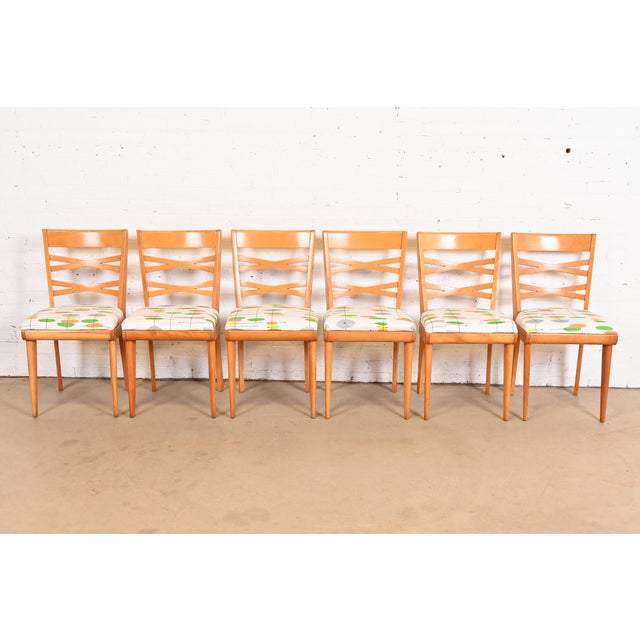 A gorgeous set of six Mid-Century Modern side chairs or dining chairs By Heywood Wakefield USA, 1950s Solid sculpted maple...