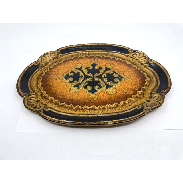 Vintage Florentia made in Italy decorative tray. Gold gilded with black hand painted tray. Perfect for decor or everyday...