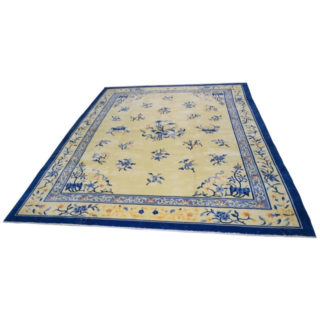 Hand-knotted with care using traditional rug-making techniques, this wool rug blends timeless craftsmanship with a modern...