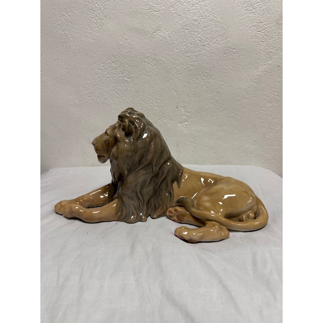 Majestic porcelain lion figurine manufactured by Bing and Grondahl, Copenhagen, Denmark. A manufactures mark is located on...