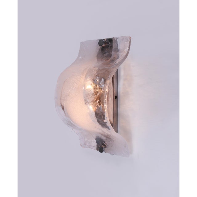 Elegant murano wall sconce and flush mount made of handblown white and clear murano glass mounted on a chromed back plate....