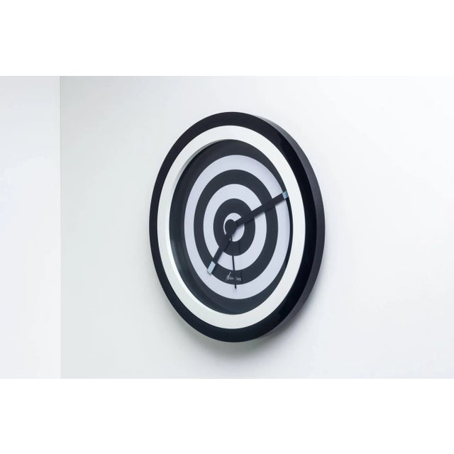 Neos Lorenz du Pasquier & Sowden Postmodern Clock A black and white, bullseye-like design plastic postmodern wall clock...