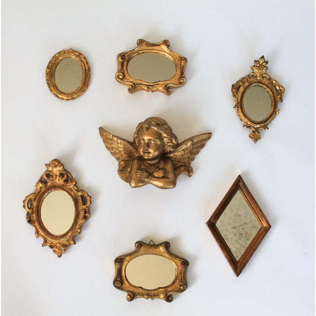 Gold resin vintage cherub wall hanging. No maker mark. Minor age wear. Ready to hang.