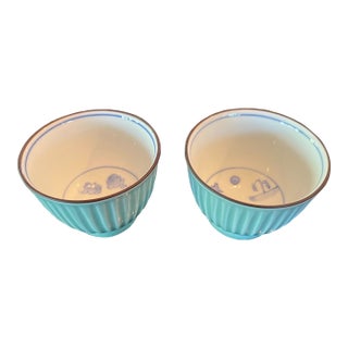 1970s Japanese Celadon Vertical Pattern Trumpeted Teacups With Blue White Village Designs - Pair For Sale