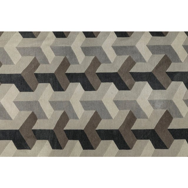 Handwoven in wool, this 7x8 vintage Verner Panton “Ypsilon” rug originating circa 1926-1998, represents a striking example...