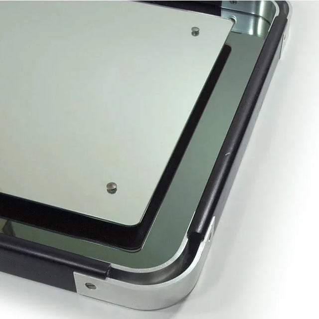 Large wall mirror produced in Italy in the eighties of the twentieth century. It is made of two sheets of crystal glass...