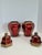 A pair of brilliantly colored enamel and brass ginger jars made in India for Rosenthal-Netter. As an importer of...