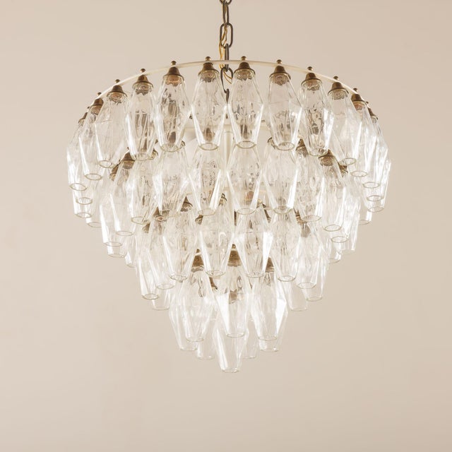 This vintage murano glass poliedri chandelier was designed by carlo scarpa and made in the 1960s by venini. The debut of...