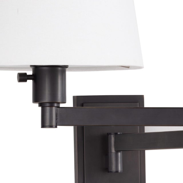 A traditional task sconce with a modern twist, the Virtue has the added functionality of adjustability for an improved...