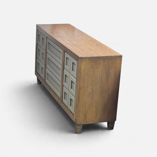 Stunning authentic vintage 1970s Thomasville triple lowboy dresser from their Huntley Furniture line. A masterful blend of...
