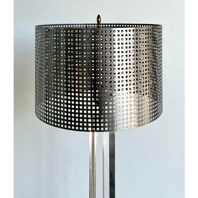 This striking vintage floor lamp is a masterful fusion of Space Age futurism and Mid-Century Modern elegance. The fixture...