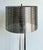 This striking vintage floor lamp is a masterful fusion of Space Age futurism and Mid-Century Modern elegance. The fixture...