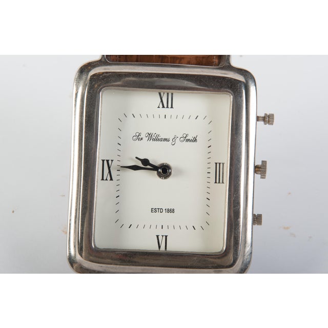 Sir Williams & Smith store display wrist watch desk clock with leather straps. Clock face is 5 inches by 6 inches high....