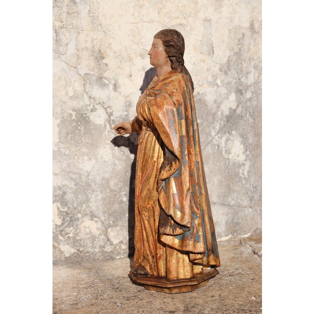 Date: 18th Century. Country: Portugal. Material: Polychrome Wood, Glass Eyes. Item condition: Some flaws and cracks along...