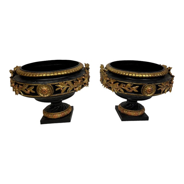 Neoclassical Black and Gilt Cast Iron Planters - A Pair For Sale