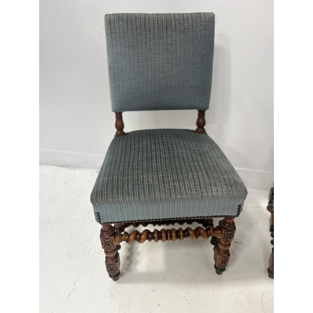 Pair of louis xiii style oak chairs upholstered seat and back in fabric (very clean) twisted legs with h-shaped stretcher...